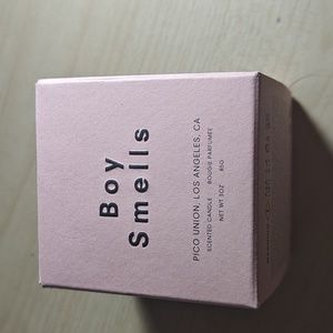 Boy smells hinoki fantome candle